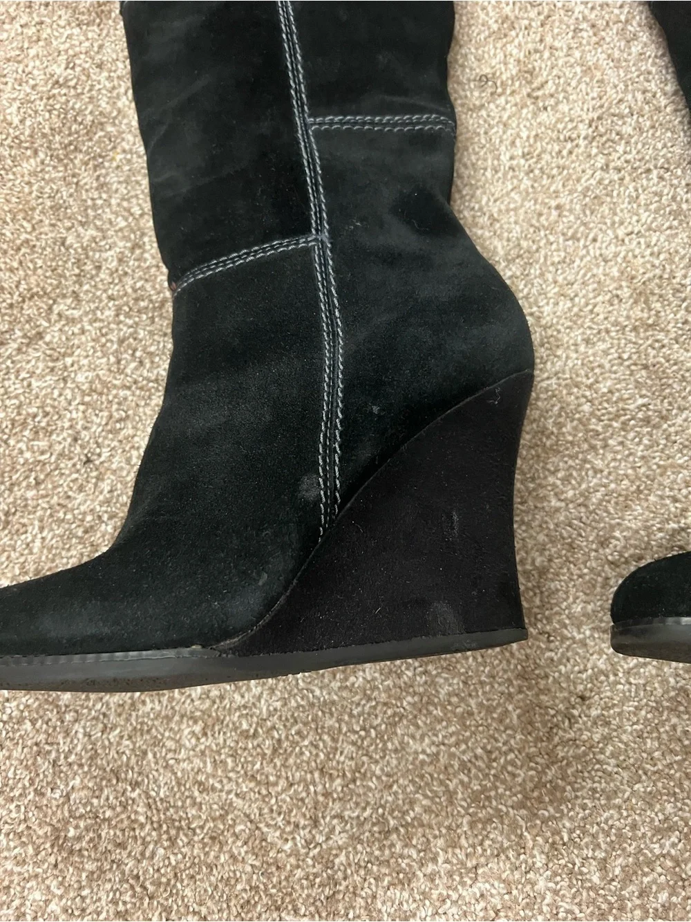 Genuine Stylish black suede knee boots with a comfortable wedge heel.